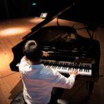 back-view-grand-piano-man-2378209